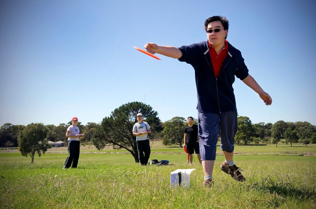 Person playing disc golf