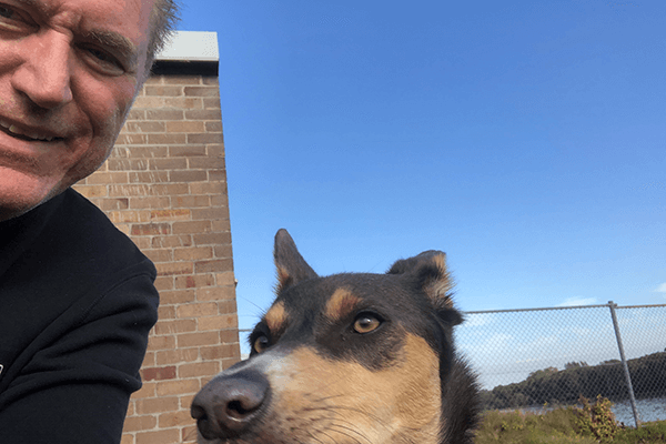 Australian Kelpie Ned with their human Tony outside in the Park