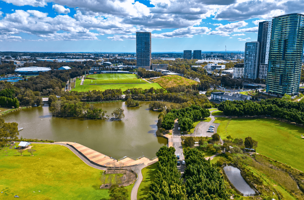 Ariel image of parklands and buildings at Sydney Olympic Park