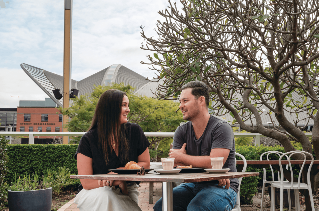 Image of two people sitting in a cafe at Sydney Olympic Park